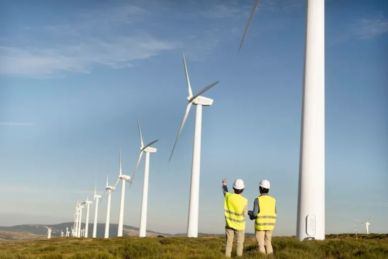 Wind turbines across green fields